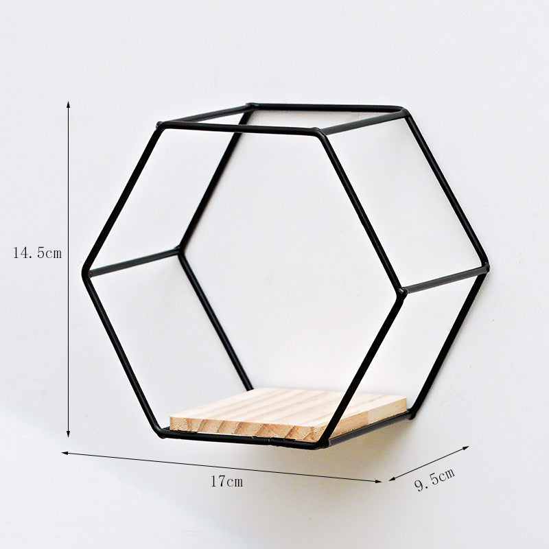 Hexagonal Iron Shelves On Wrought Wall